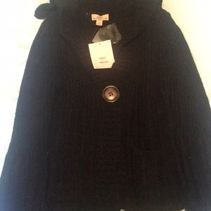 Sweater with large button